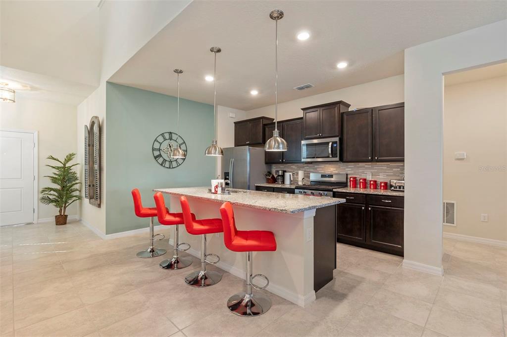 7195 OAKMOSS LOOP, DAVENPORT, FL — photo 5 of 30