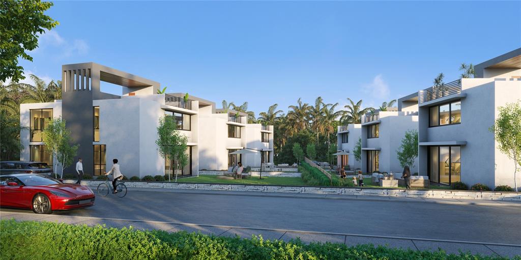 A rendering of modern multi-story residential buildings with white facades and a red sports car — 115 CARR 115 KM 11.9, RINCON, PR