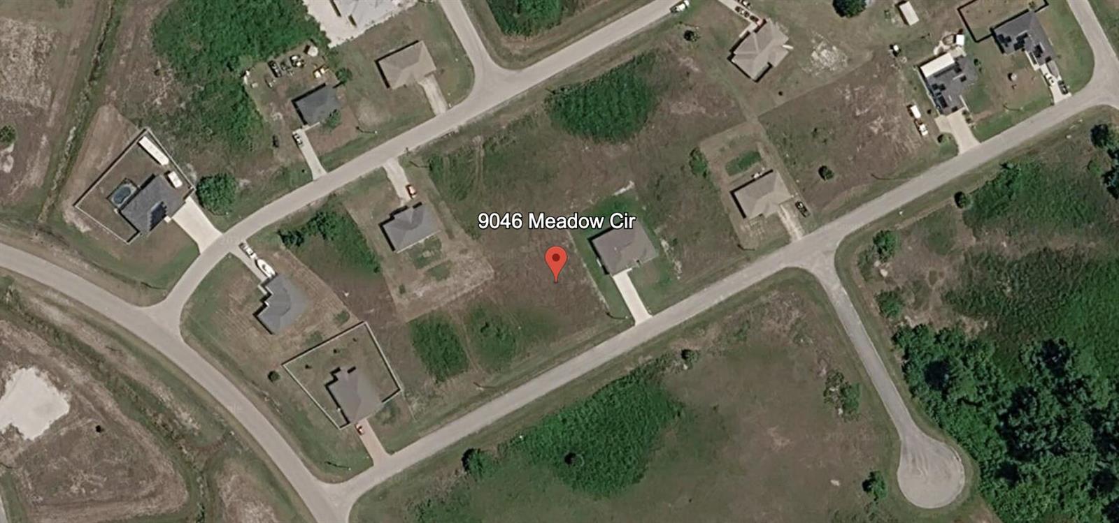 This satellite map view shows a residential lot with a house under construction — 9046 Meadow Circle, FL 33935, FL