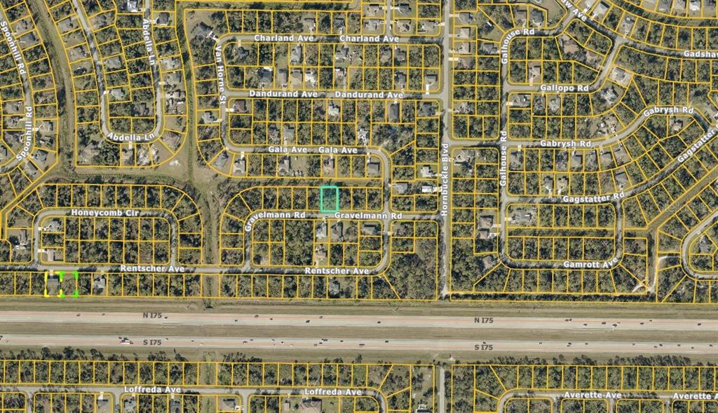 This is an aerial map view of a residential neighborhood with highlighted property lots — GRAVELMANN RD, NORTH PORT, FL