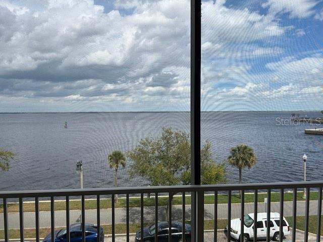 A view of a large body of water from a screened-in balcony — 225 W SEMINOLE BOULEVARD UNIT 308, SANFORD, FL