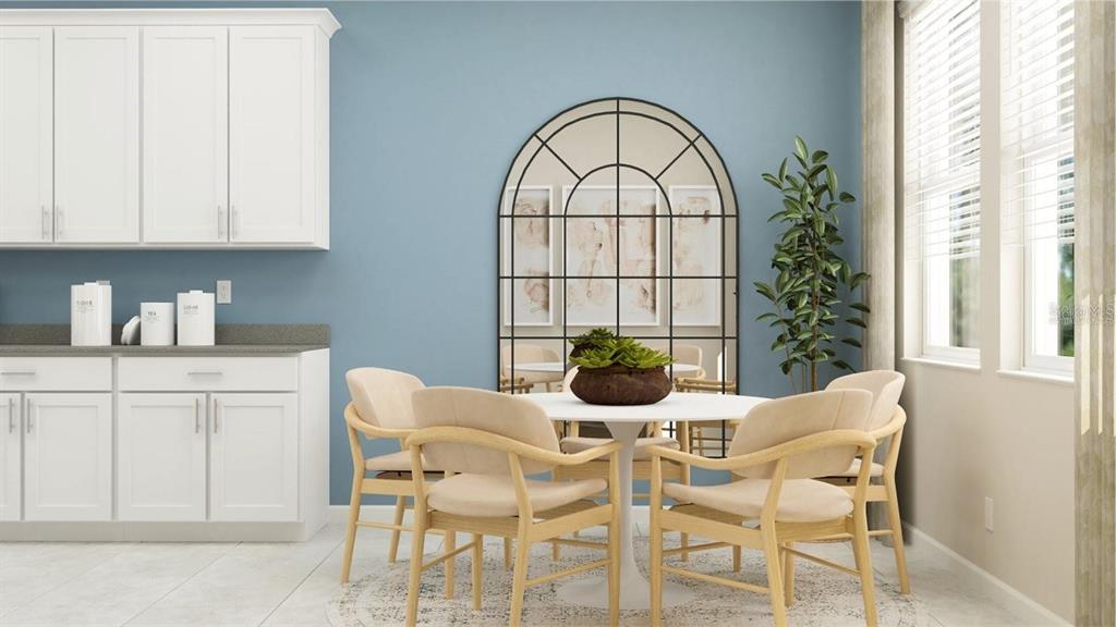 This is a digital rendering of a dining area with white cabinets and blue walls — 2155 RIDER RAIN LANE, APOPKA, FL