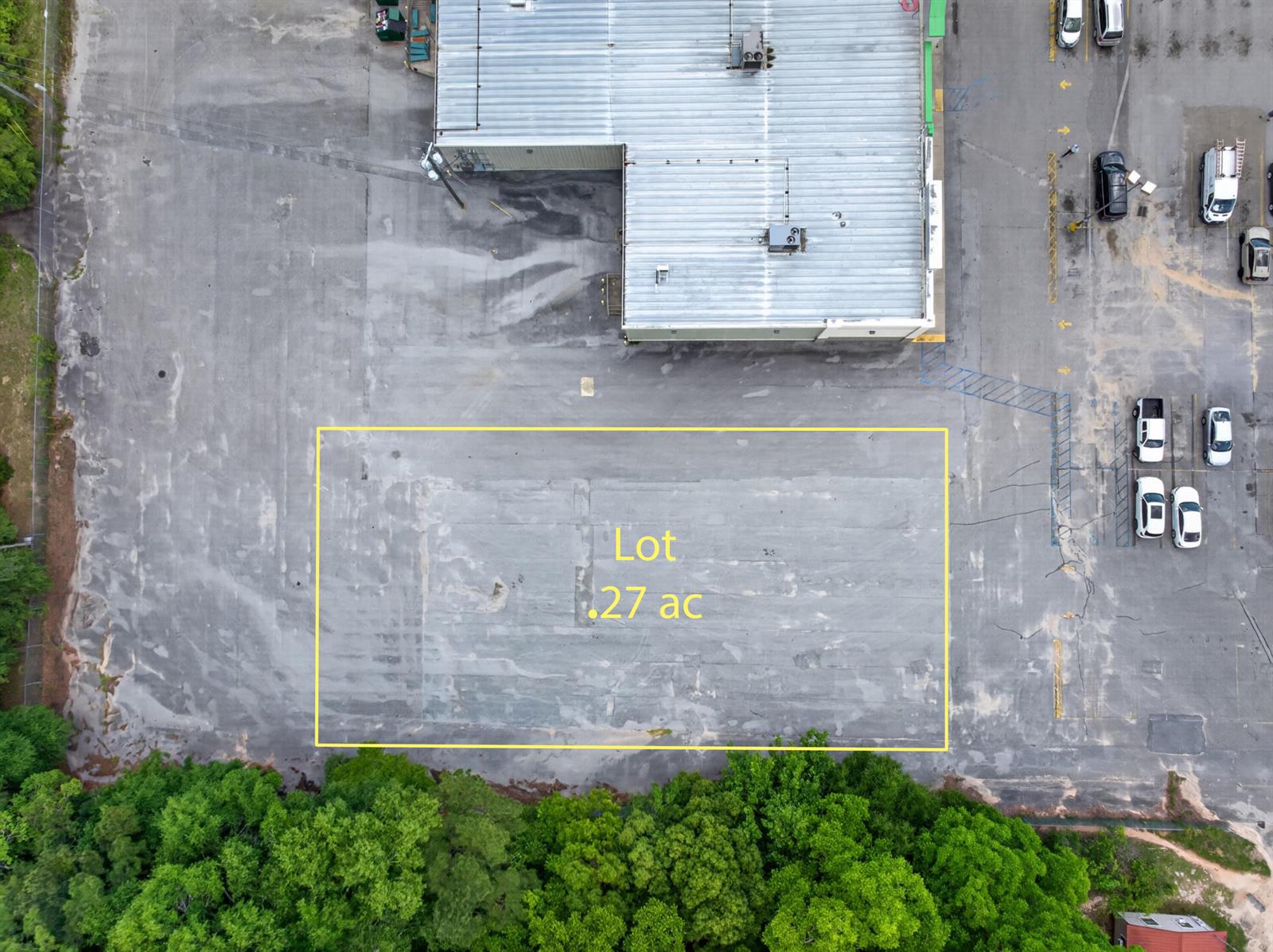 An aerial view shows a rectangular paved lot marked as .27 acres next to a building — 0 South Drive, FL 32433, FL