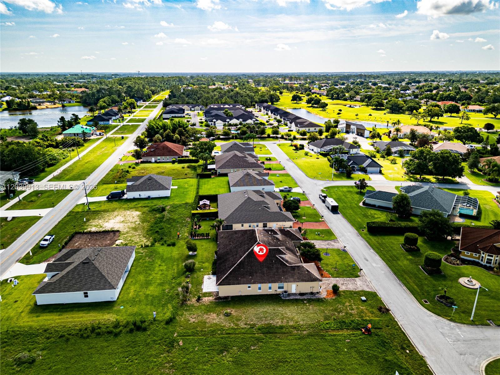 An aerial view shows a suburban neighborhood with single-family homes and a marked property — 6938 Cecilia Ave, Sebring FL 33872, SEBRING, FL