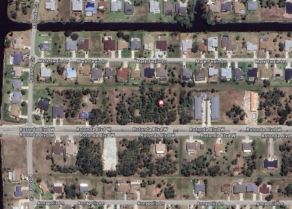This aerial map shows a vacant residential lot marked with a red dot — 274 ROTONDA BOULEVARD W, ROTONDA WEST, FL