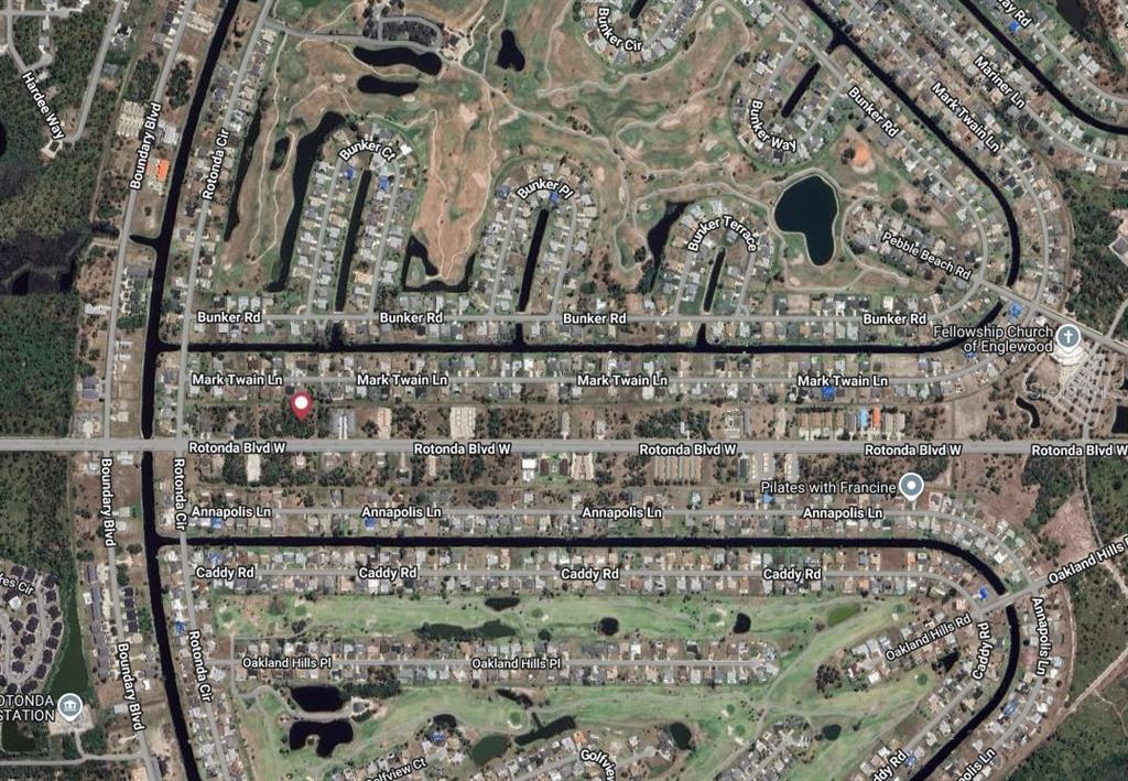 This is an aerial map view of a residential neighborhood with streets and golf courses — 274 ROTONDA BOULEVARD W, ROTONDA WEST, FL