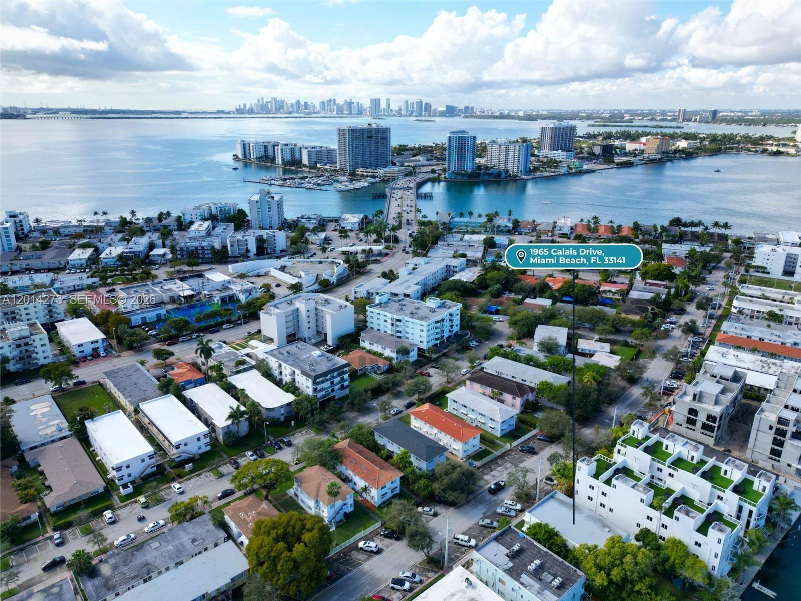 This aerial view shows a residential neighborhood in Miami Beach near the water — 1965 Calais Dr # 7, Miami Beach FL 33141, MIAMI BEACH, FL