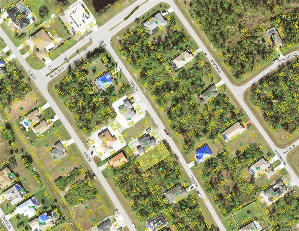 This is an aerial map showing residential lots, streets, and property boundaries — 115 WAHOO DRIVE, ROTONDA WEST, FL