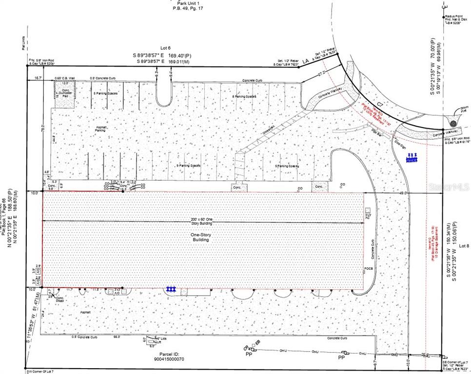 This is a site survey map showing a commercial property with a building and parking lot — 402 CHAIRMAN COURT, DEBARY, FL