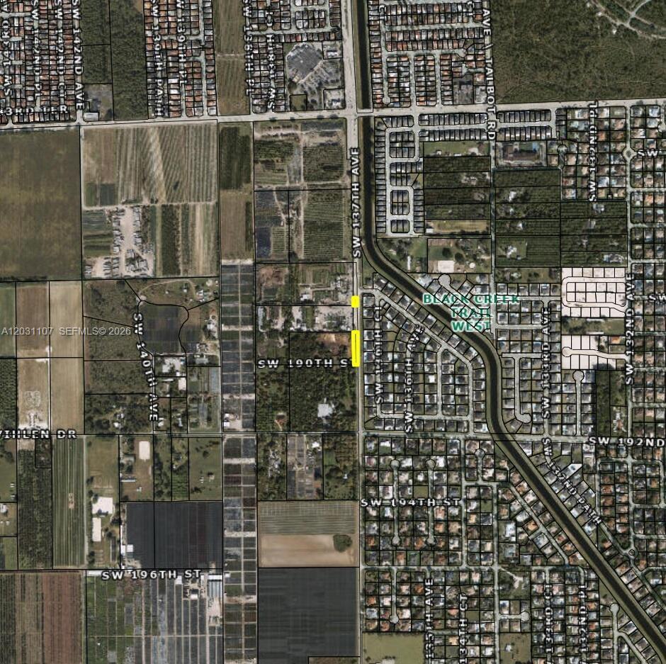This is an aerial map showing a plot of land highlighted in yellow — 19000 SW 137th Ave, Miami FL 33177, MIAMI, FL