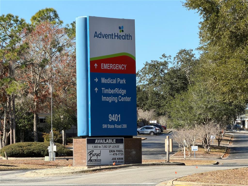 A tall AdventHealth monument sign stands at the entrance of a commercial property — SW 135TH STREET ROAD LOT 12, OCALA, FL