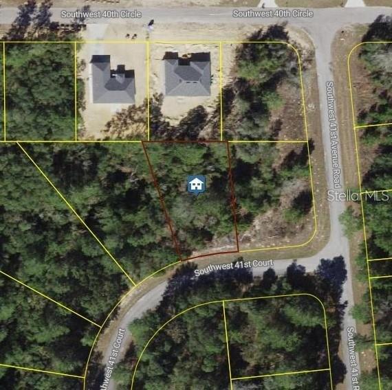 This is an aerial map showing a vacant, wooded residential lot outlined in red — SW 41ST COURT, OCALA, FL