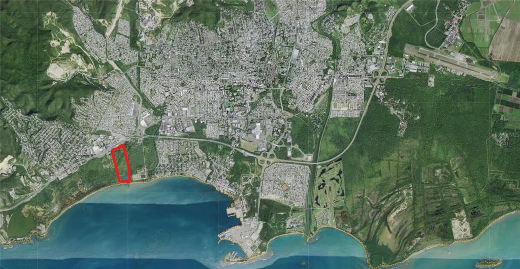 An aerial map view shows a coastal area with a red outline highlighting a property — Lot C ROAD #2, PONCE, PR