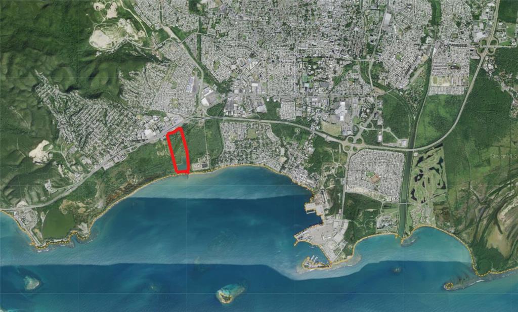 This is an aerial map showing a parcel of land outlined in red near a coastline — Lot C ROAD #2, PONCE, PR