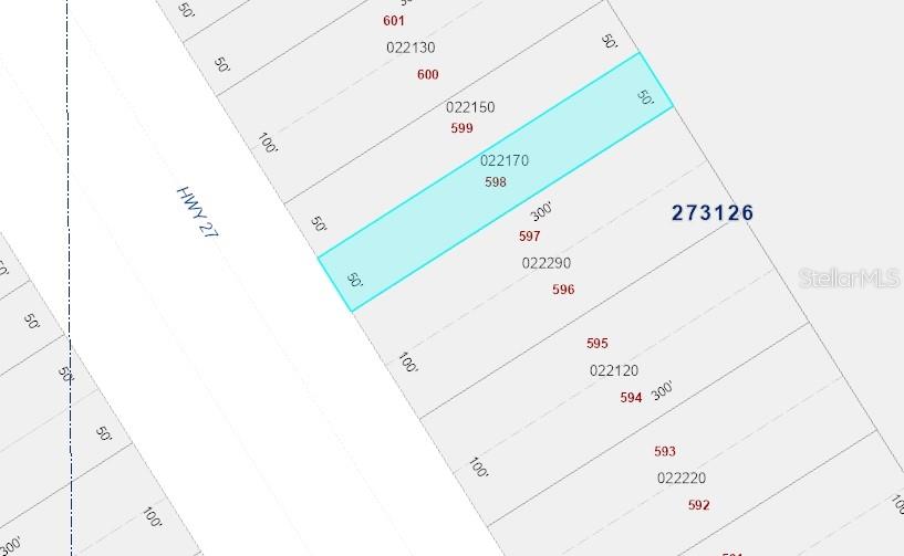 This is a property map showing a highlighted rectangular land parcel along a highway — US HWY 27, FROSTPROOF, FL