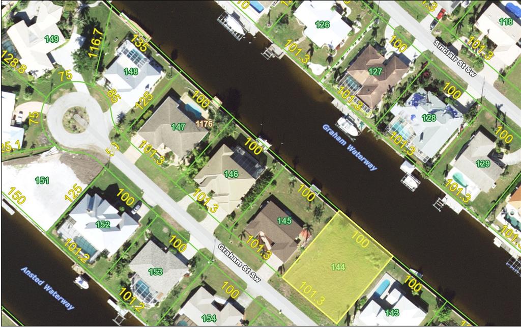 This is an aerial map showing residential lots along a waterway — 122 GRAHAM STREET SW, PORT CHARLOTTE, FL