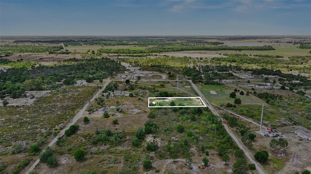 An aerial view shows a rectangular plot of land outlined in white amidst rural terrain — 0 ALLISON AVENUE, LAKE WALES, FL