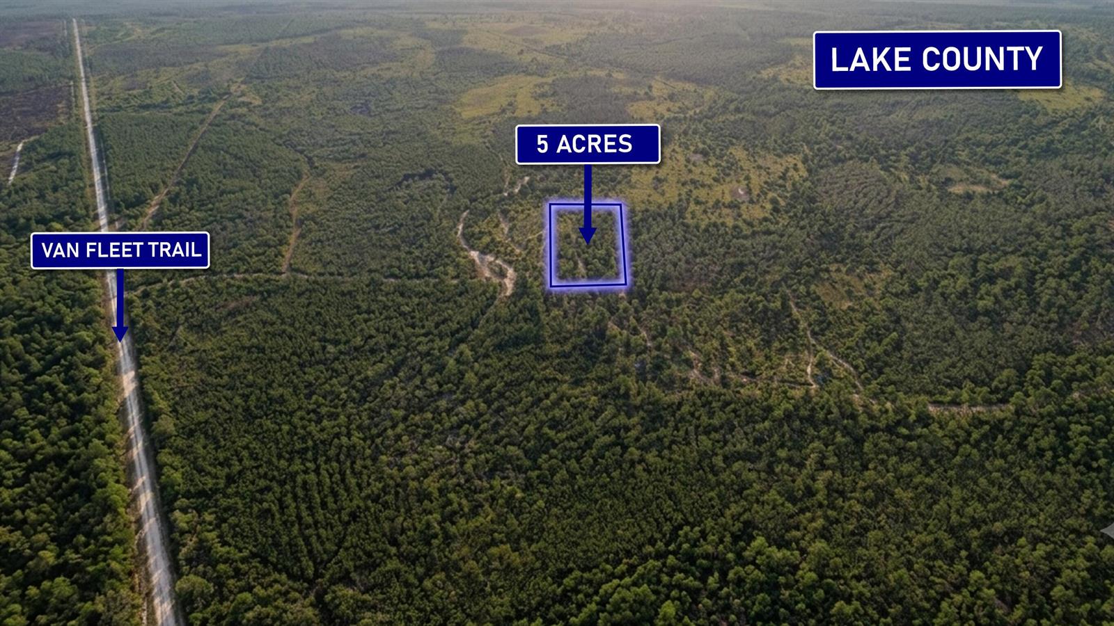 An aerial view shows a five-acre plot of land near the Van Fleet Trail — 0000 Calvin Lee Road, Clermont FL 34711, CLERMONT, FL