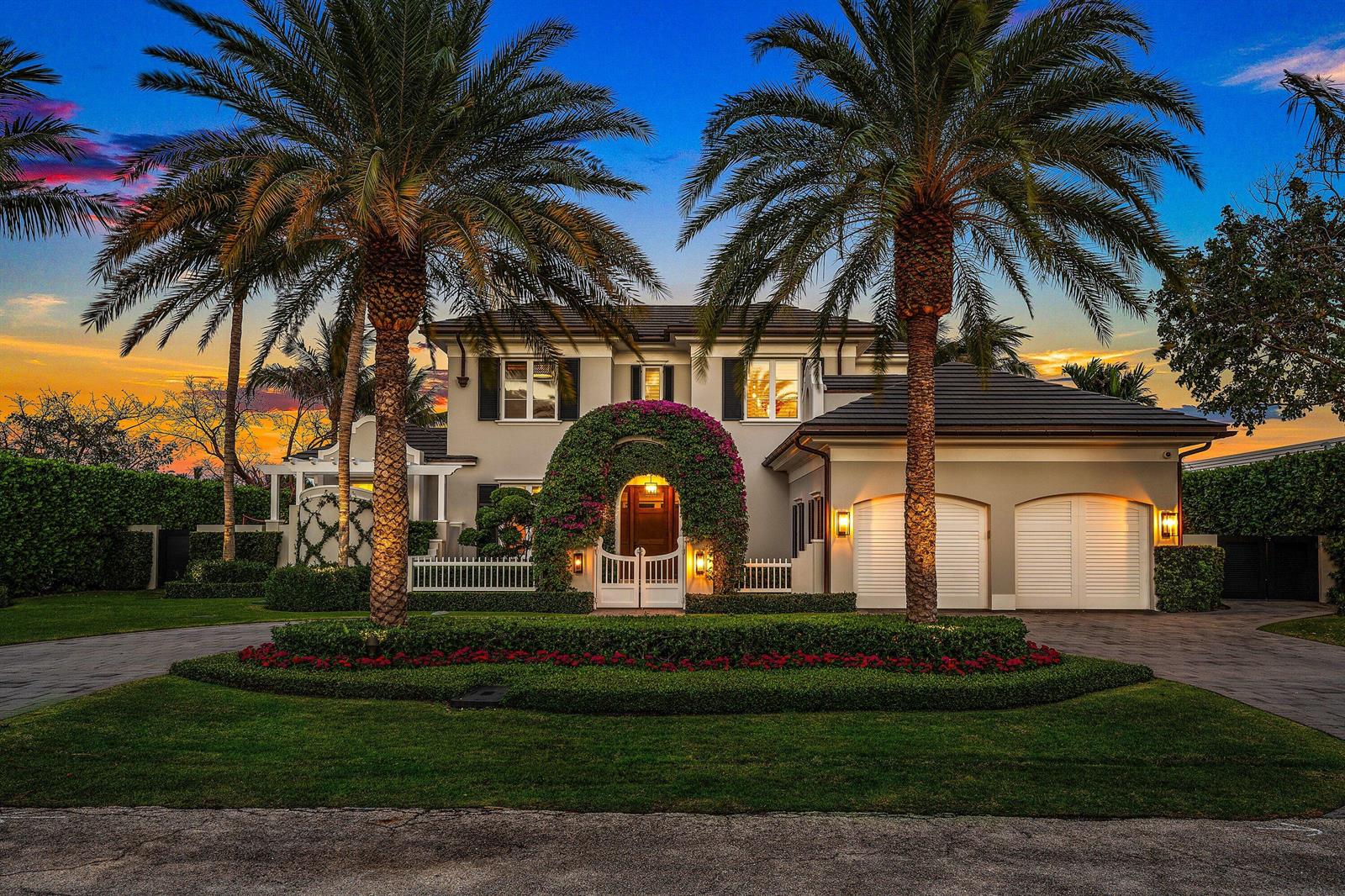 A two-story house with a bougainvillea-covered entryway, two palm trees, and a two-car garage — 2530 Avenue Au Soleil, Gulf Stream FL 33483, GULF STREAM, FL