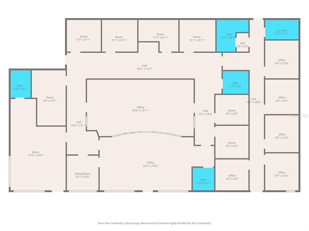 This is a floor plan of a large office building with multiple rooms and bathrooms — 15010 CORTEZ BOULEVARD, BROOKSVILLE, FL