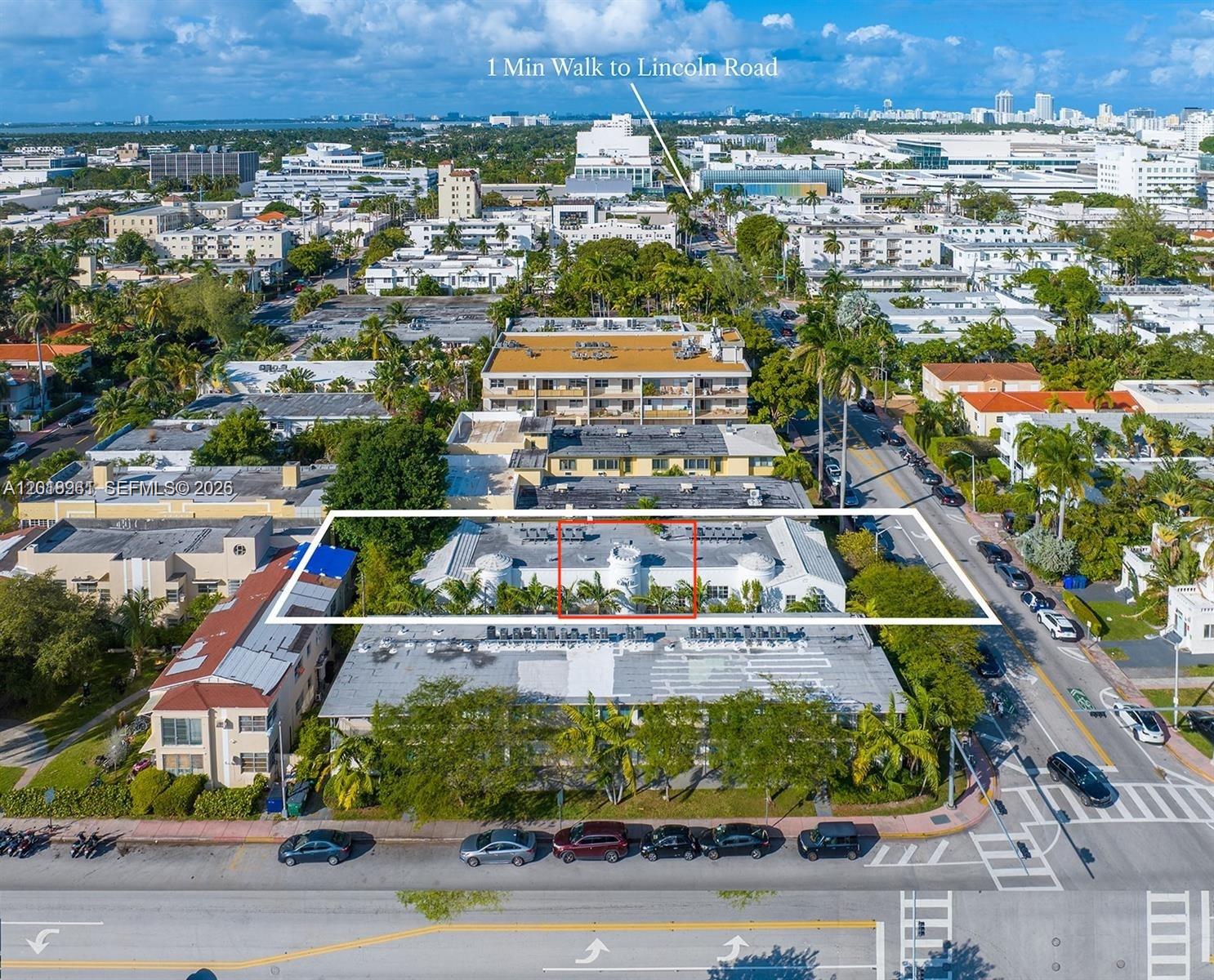 An aerial view shows a white building with a central turret and surrounding palm trees — 1508 Meridian Ave, Miami Beach FL 33139, MIAMI BEACH, FL