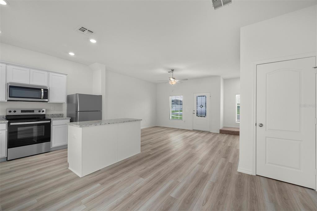 13450 LEAPING WATER WAY, ASTATULA, FL — photo 5 of 20