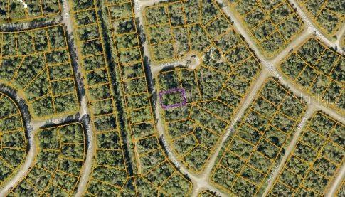 This is an aerial map showing a vacant lot outlined in purple within a residential subdivision — HAVEMEYER STREET, NORTH PORT, FL
