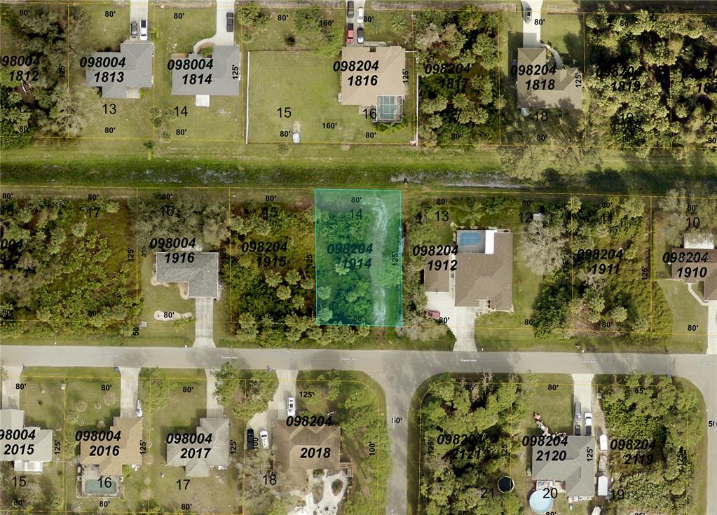 This is an aerial map showing residential property lot lines and parcel numbers — TUPELO (LOT 14) AVENUE, NORTH PORT, FL
