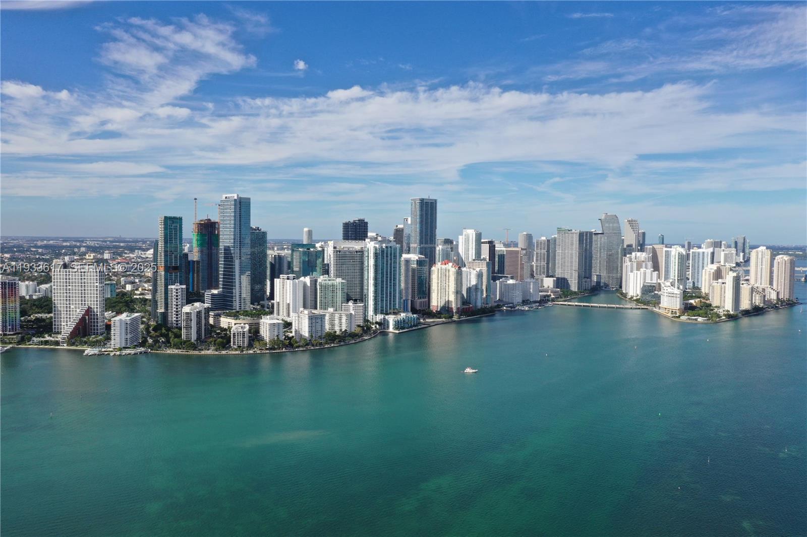 An aerial view of the Miami skyline featuring numerous high-rise buildings along the waterfront — 1331 Brickell Bay Dr # 1609, Miami FL 33131, MIAMI, FL
