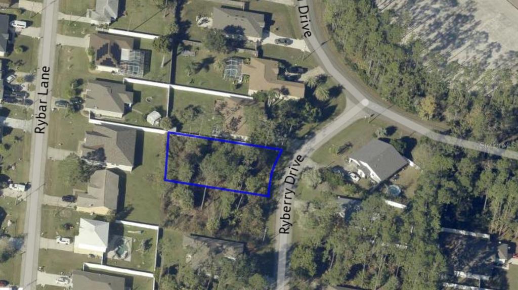 This aerial map shows a vacant, wooded residential lot outlined in blue between two streets — 4 RYBERRY DRIVE, PALM COAST, FL