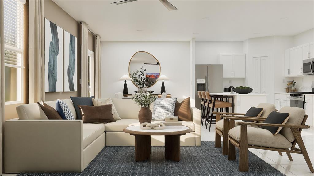 This rendering shows an open-concept living room with a sectional sofa, coffee table, and kitchen — 1144 HOUR GLASS ROAD, LAKELAND, FL