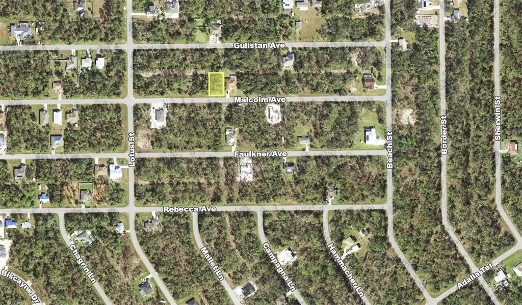 This is an aerial map view of a residential neighborhood with a highlighted vacant lot — 15184 MALCOLM AVENUE, PORT CHARLOTTE, FL