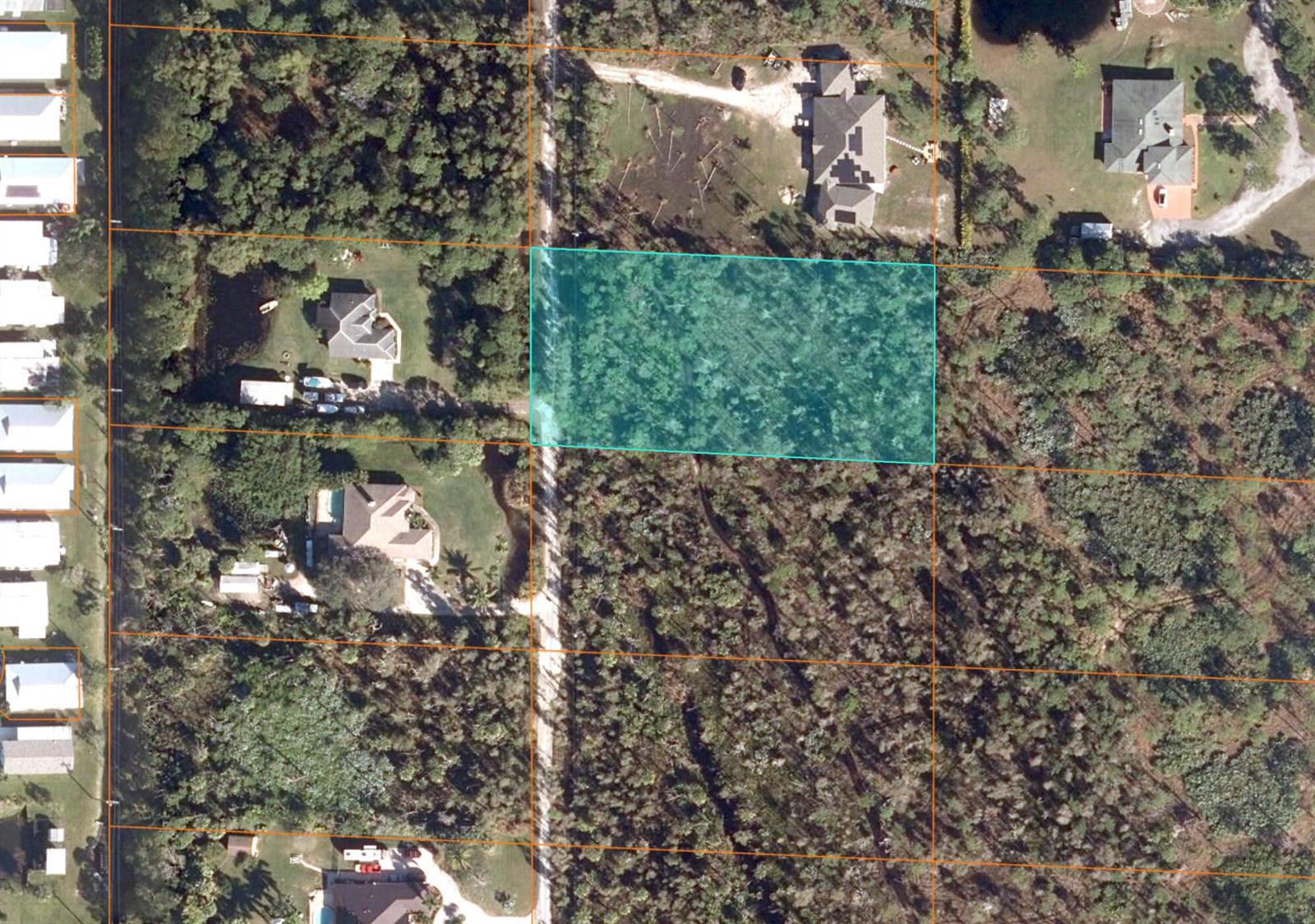 This is an aerial map showing a highlighted rectangular plot of land among wooded lots — -- Dyer Road, Fort Pierce FL 34952, FORT PIERCE, FL