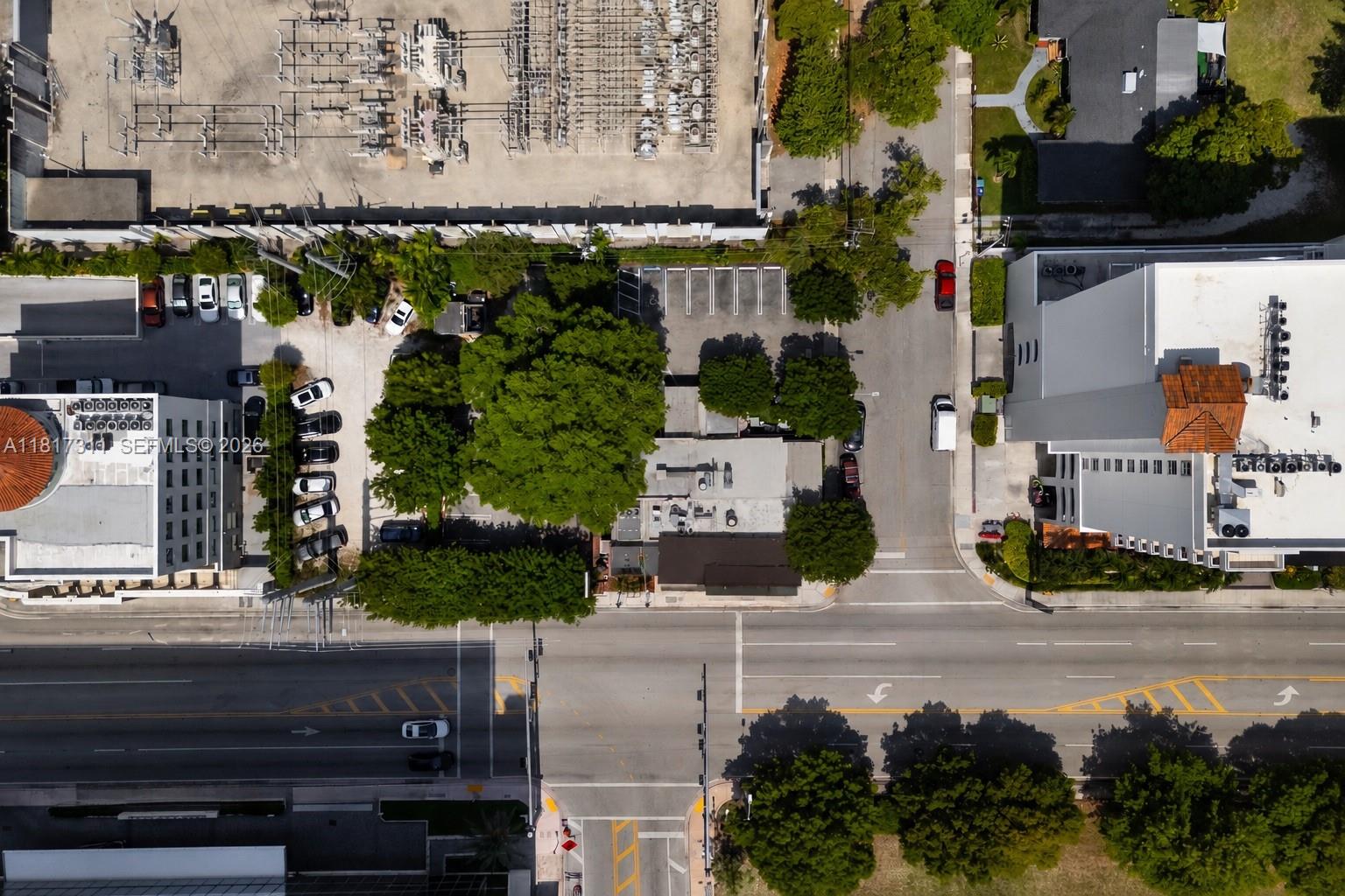 An aerial view shows a commercial building, parking lot, and adjacent electrical substation — 2345 SW 37th Ave, Miami FL 33145, MIAMI, FL