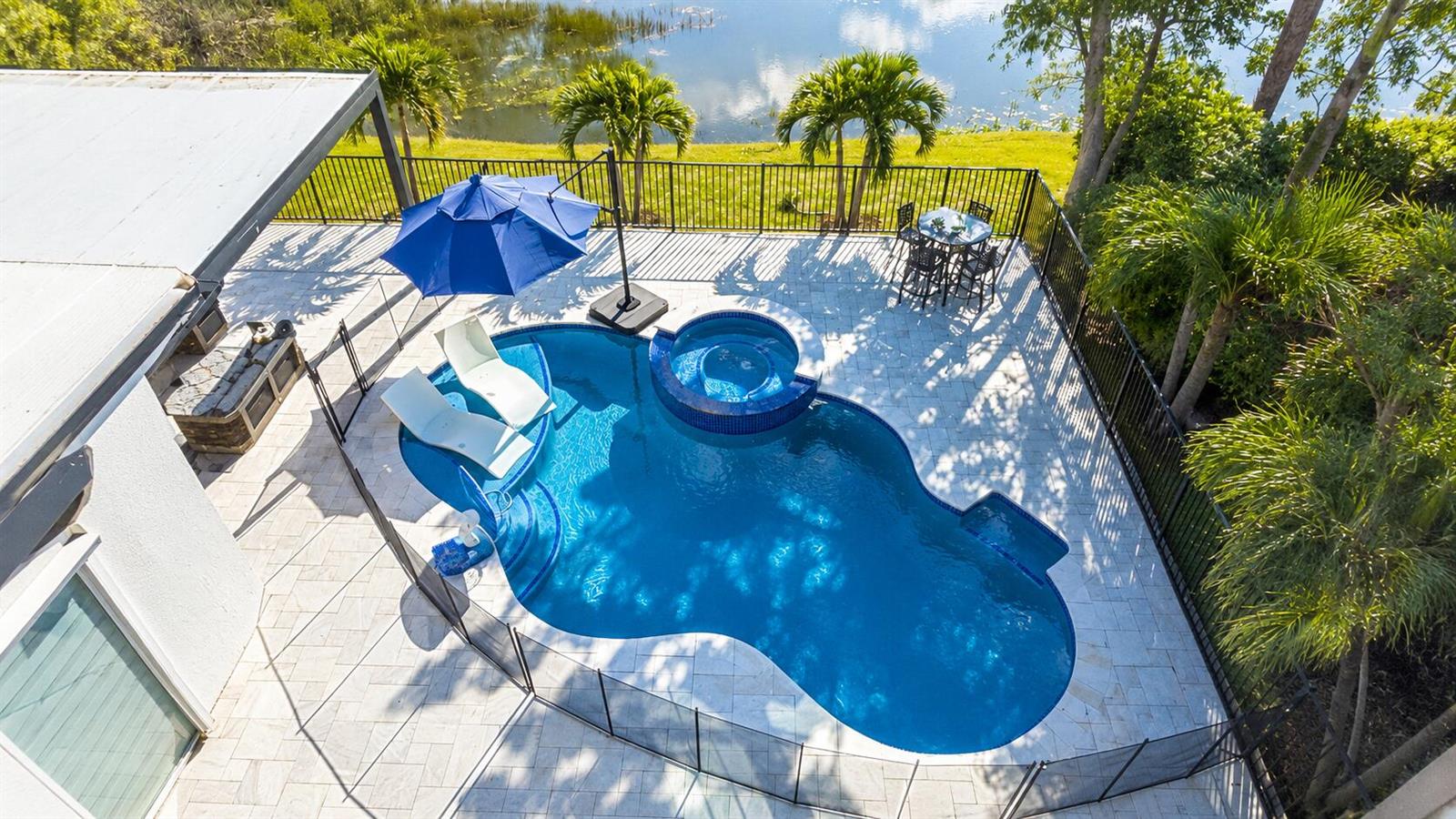 This floor plan shows a single-story house with a swimming pool, patio, and attached garage — 8170 NW 124th Terrace, Parkland FL 33076, PARKLAND, FL