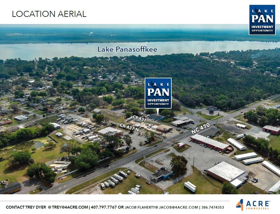 This aerial view shows a commercial property located near Lake Panasoffkee and local roadways — 1481 CR 437, LAKE PANASOFFKEE, FL