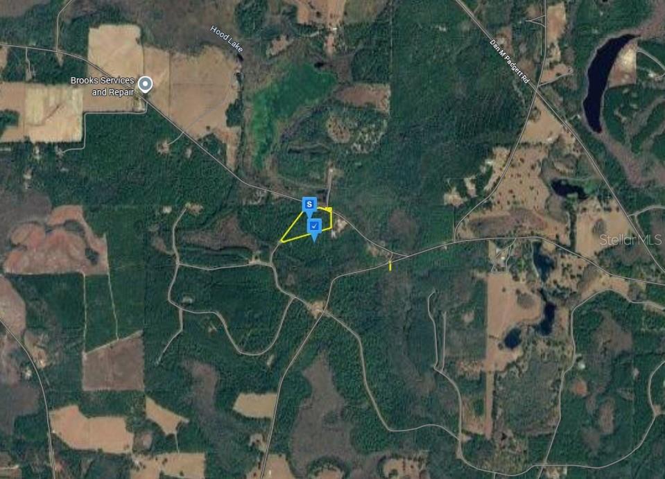 This is an aerial map showing a highlighted parcel of land in a rural area — 1711 SHORT PNE LANE, WESTVILLE, FL