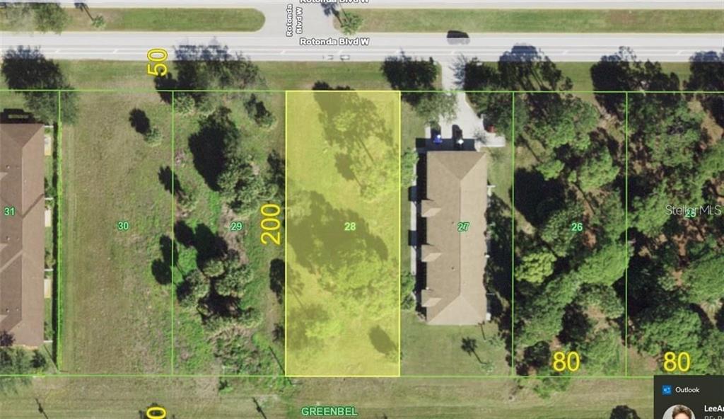 This aerial map shows a rectangular, undeveloped residential lot highlighted in yellow between two houses — 201 ROTONDA BOULEVARD W UNIT 3, ROTONDA WEST, FL