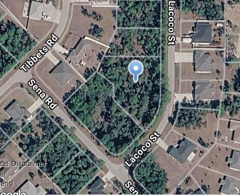 This is an aerial map view of a vacant, wooded residential lot — LACOCO STREET, NORTH PORT, FL