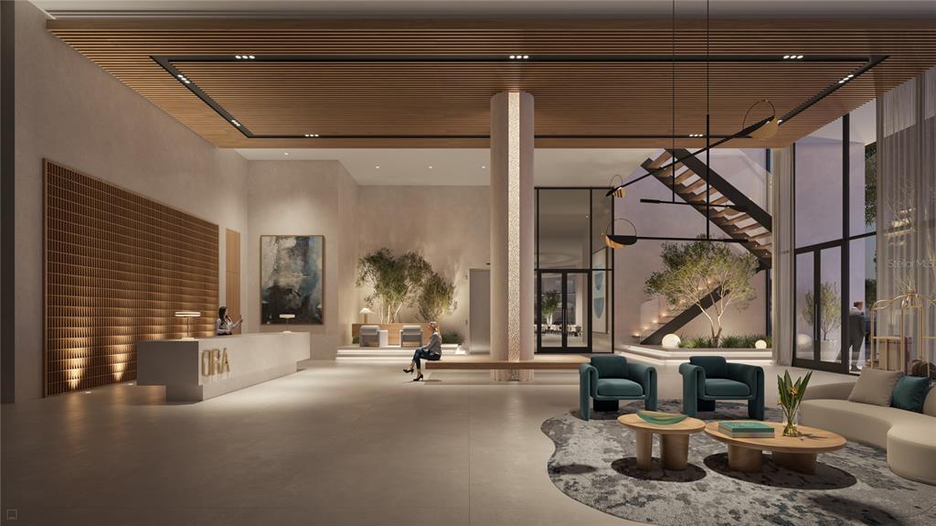 This rendering shows a modern, high-ceilinged lobby with a reception desk, lounge seating, and staircase — 1101 E JACKSON STREET UNIT 3021, TAMPA, FL
