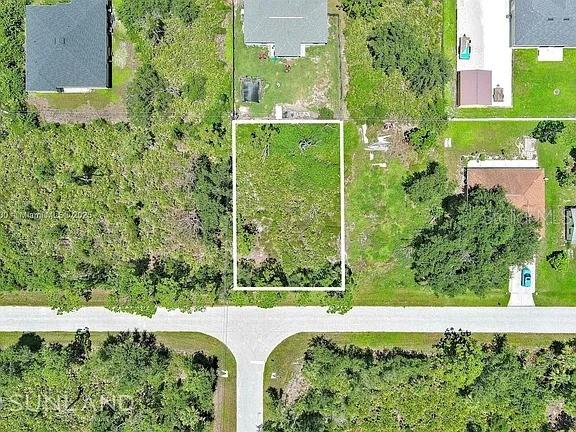 This is an aerial view of a vacant, rectangular residential lot — 11944 BROOKSIDE AVENUE, PORT CHARLOTTE, FL