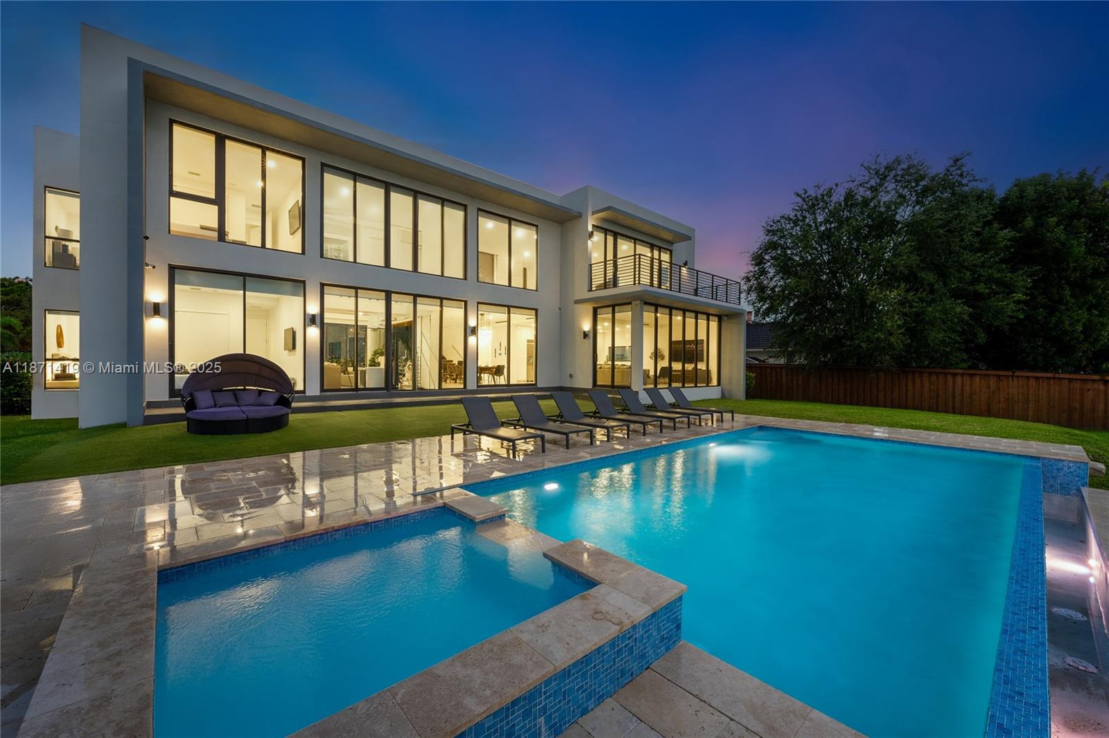 A modern two-story house with large glass windows overlooks a swimming pool and spa — 5420 SW 72nd Ave, Miami FL 33155, MIAMI, FL