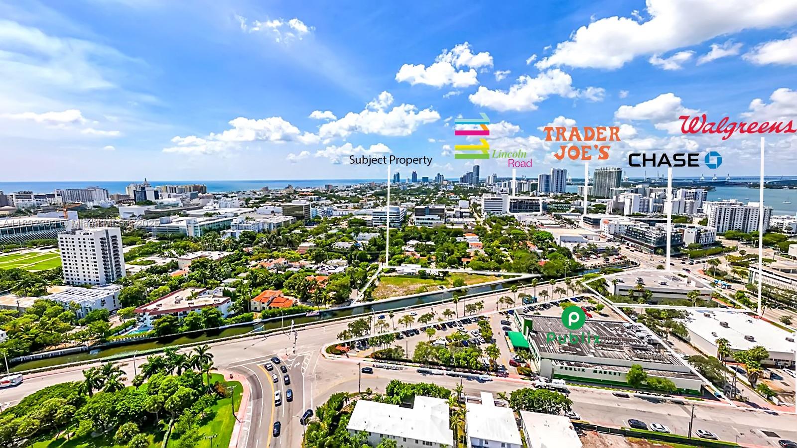 An aerial view shows a city landscape with a highlighted subject property and nearby businesses — 1800 Michigan Ave, Miami Beach FL 33139, MIAMI BEACH, FL