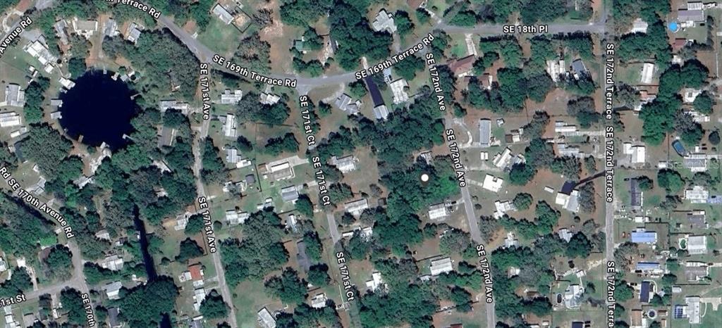 This is an aerial map view of a residential neighborhood with a circular lake — SE 172ND AVENUE, SILVER SPRINGS, FL