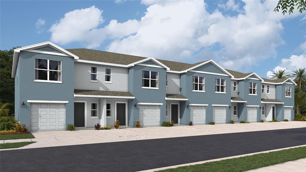 This is a digital rendering of a row of blue townhouses with attached garages — 4131 MILLER POINTE COURT, BRADENTON, FL
