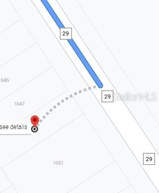 This map shows a property location with a red pin and a dashed access line — 1049 COUNTY ROAD 29, LAKE PLACID, FL