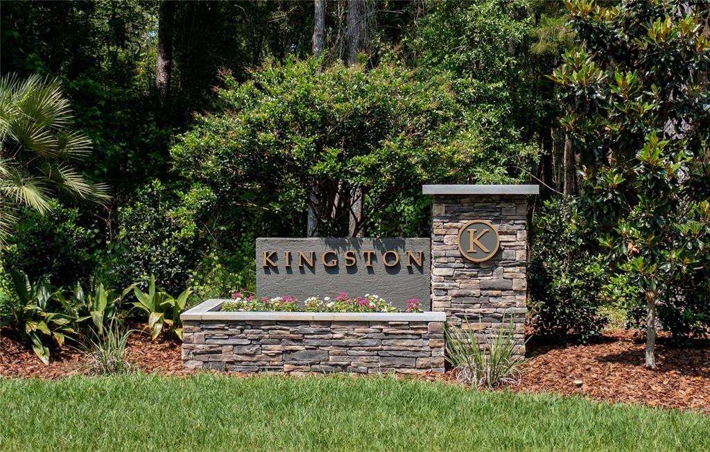 A stone monument sign with the word Kingston sits in front of trees and landscaping — TBD NW 152ND COURT, NEWBERRY, FL