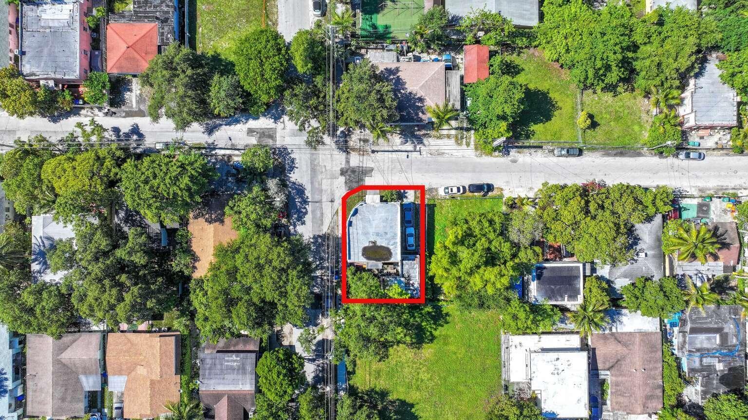 An aerial view shows a residential property with a flat roof and pool, outlined in red — 295 NE 55th Street, Miami FL 33137, MIAMI, FL