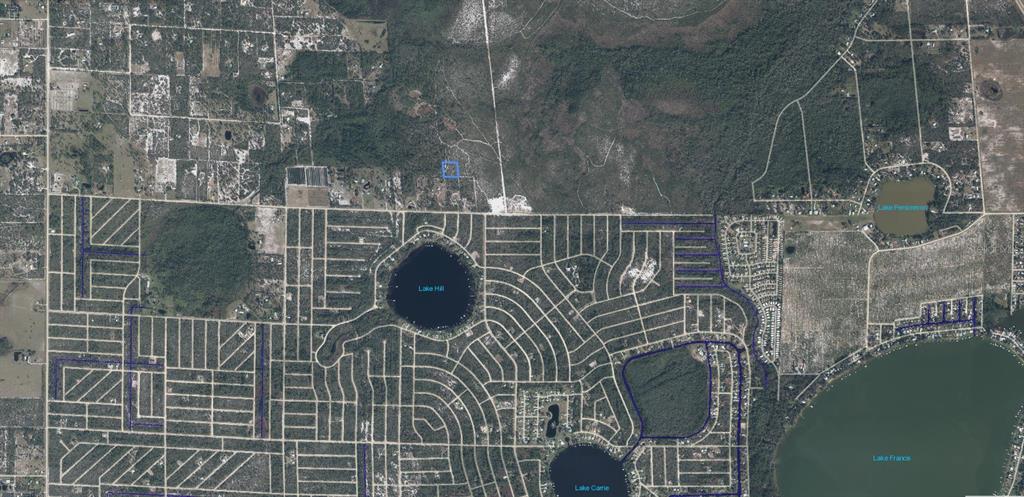 This is an aerial map showing a residential area with several lakes and a highlighted lot — 918 MIDLAND AVENUE, LAKE PLACID, FL