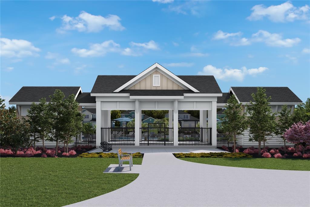 This is a two-story floor plan showing a garage, kitchen, and living areas on the first level — 5596 COOPERS HAWK COURT, ST CLOUD, FL